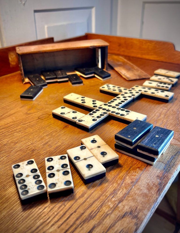 Antique Domino Set – Bone & Ebony with Original Slide-Top Box, ca. 1900–1930 Antique bone and ebony domino set with 28 pieces in original wooden slide-top box, early 20thC European origin with handwritten markings