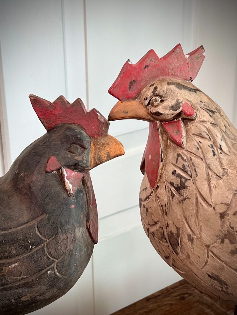 Vintage Wooden Rooster and Hen Pair Vintage carved rooster (coq en bois sculpté) and hen in painted wood. Mounted on metal bases, likely French folk art. 49 & 52 cm tall.
