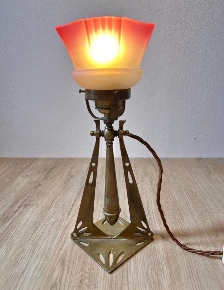 Vienna Secession Brass Gimbal Lamp – c. 1900 Vienna Secession brass gimbal lamp with red-to-white frosted glass shade, convertible desk or wall mount, c. 1900