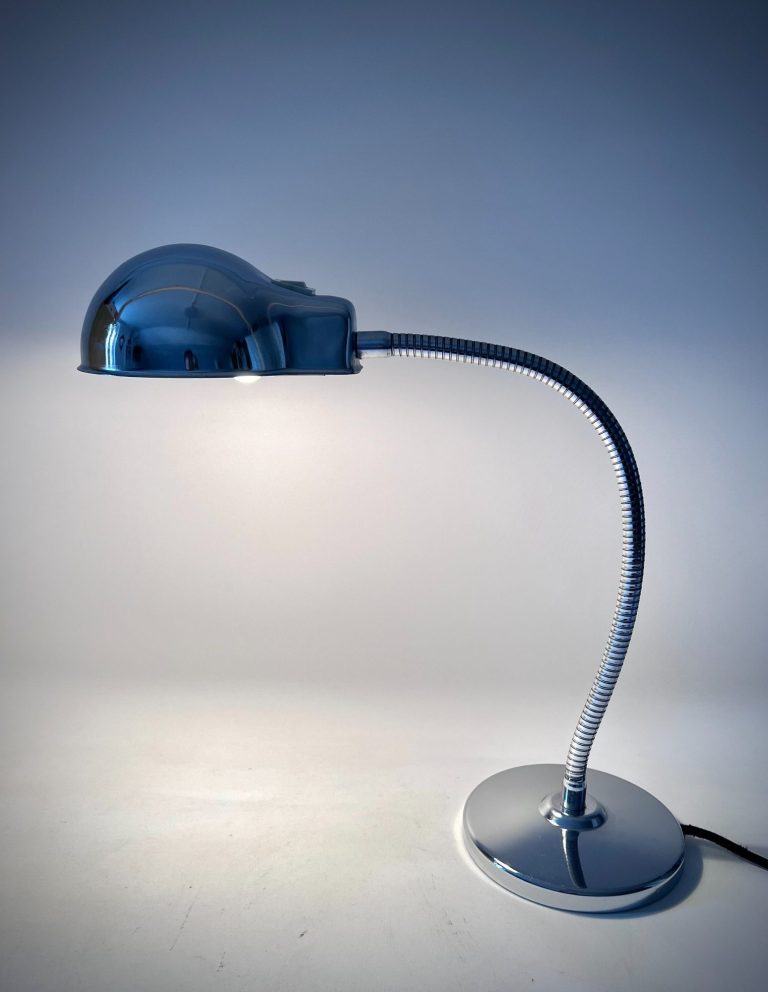 - Italian Chrome Gooseneck Lamp – 1970s, Attributed to Reggiani Vintage Italian chrome lamp, 1970s, attributed to Reggiani. Adjustable gooseneck, heavy base, dome shade. Rare industrial/Space Age hybrid