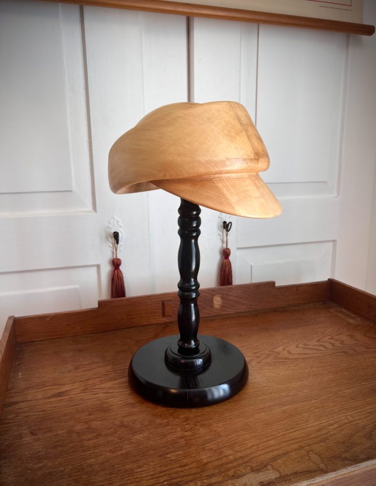 Art Deco Wooden Hat-Form on Stand – Early 20th Century Early 20th-century Art Deco wooden milliner’s hat-form with rounded crown and black turned stand